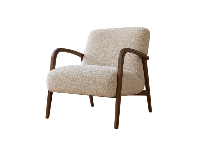 Ivory boucle chair with walnut arms on a cork floor — White background